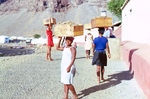 Women Transporting Boxes by David Baxter