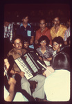Unidentified Man Playing Accordion by Rhode Island College