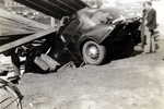 Collapsed Automobile. by Zenas Kevorkian